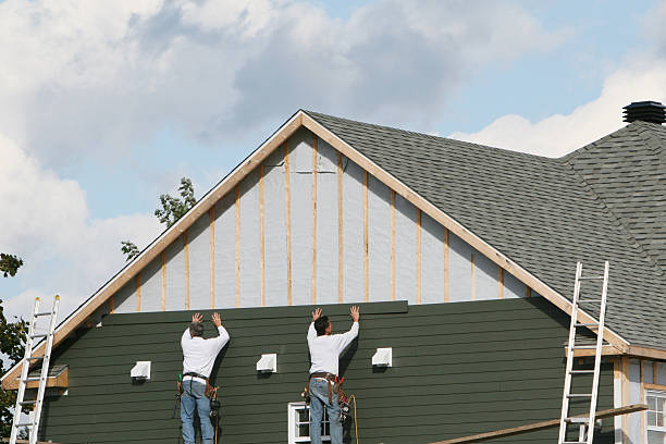 Professional Siding Contractor technician working in Oxford, PA